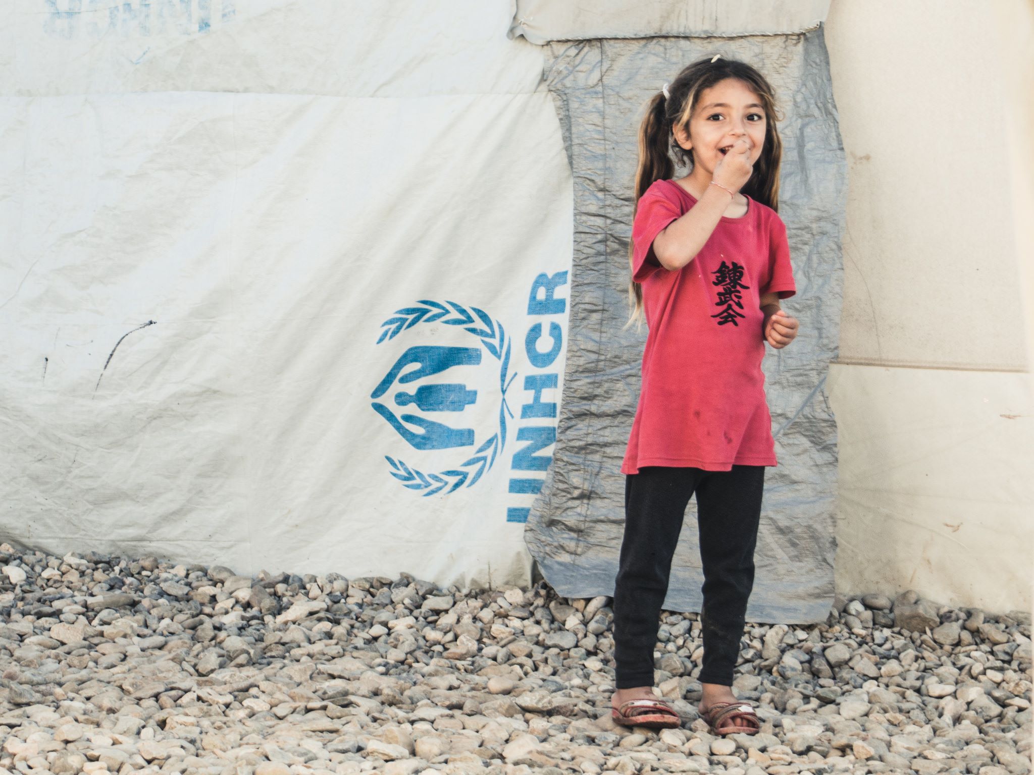 Uma das crianças no campo de refugiados do Iraque (Foto: Marco Gomes)